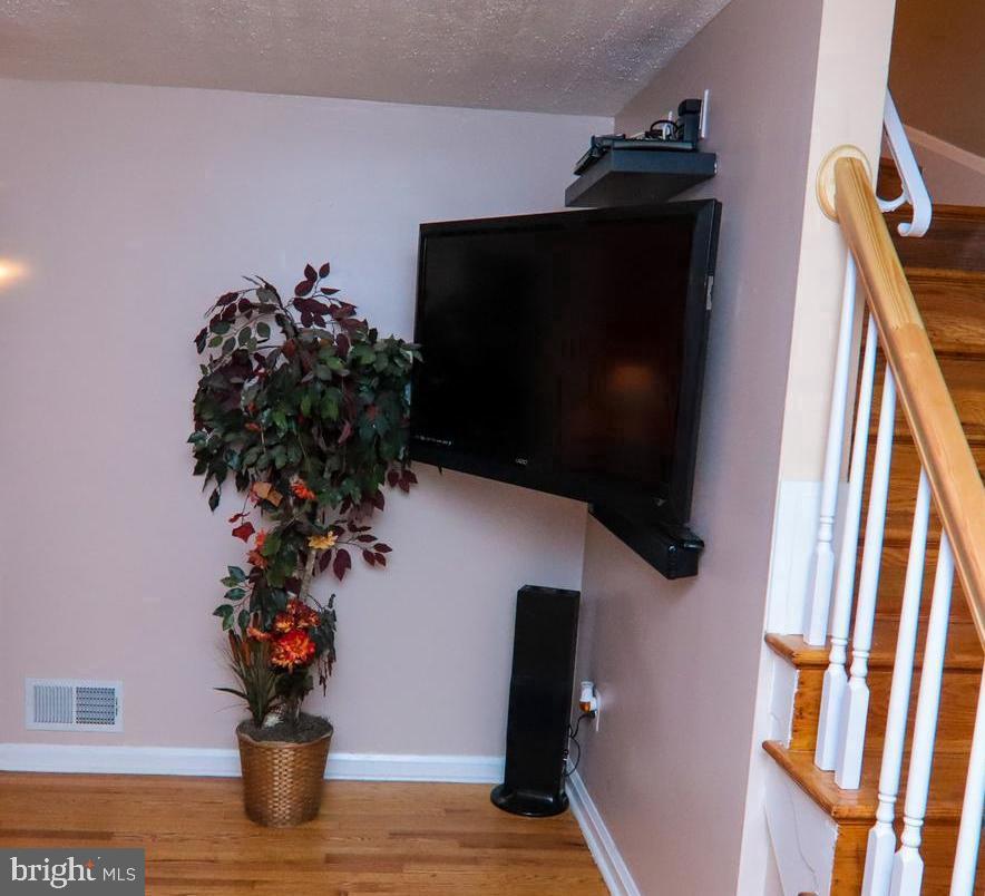 1695 Langford Road Baltimore, MD 21207 - Photo 6 of 37 Wall mount & TV included with the house!!