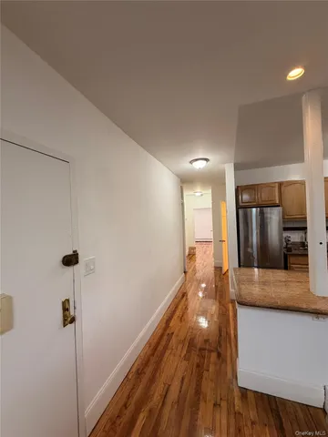 a view of a living room hardwood floor