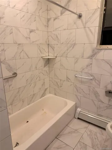 a bathroom with a bathtub