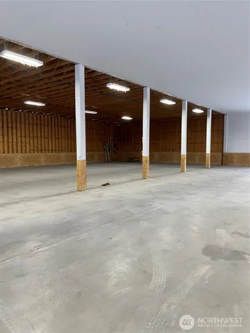 a view of entryway with wooden wall