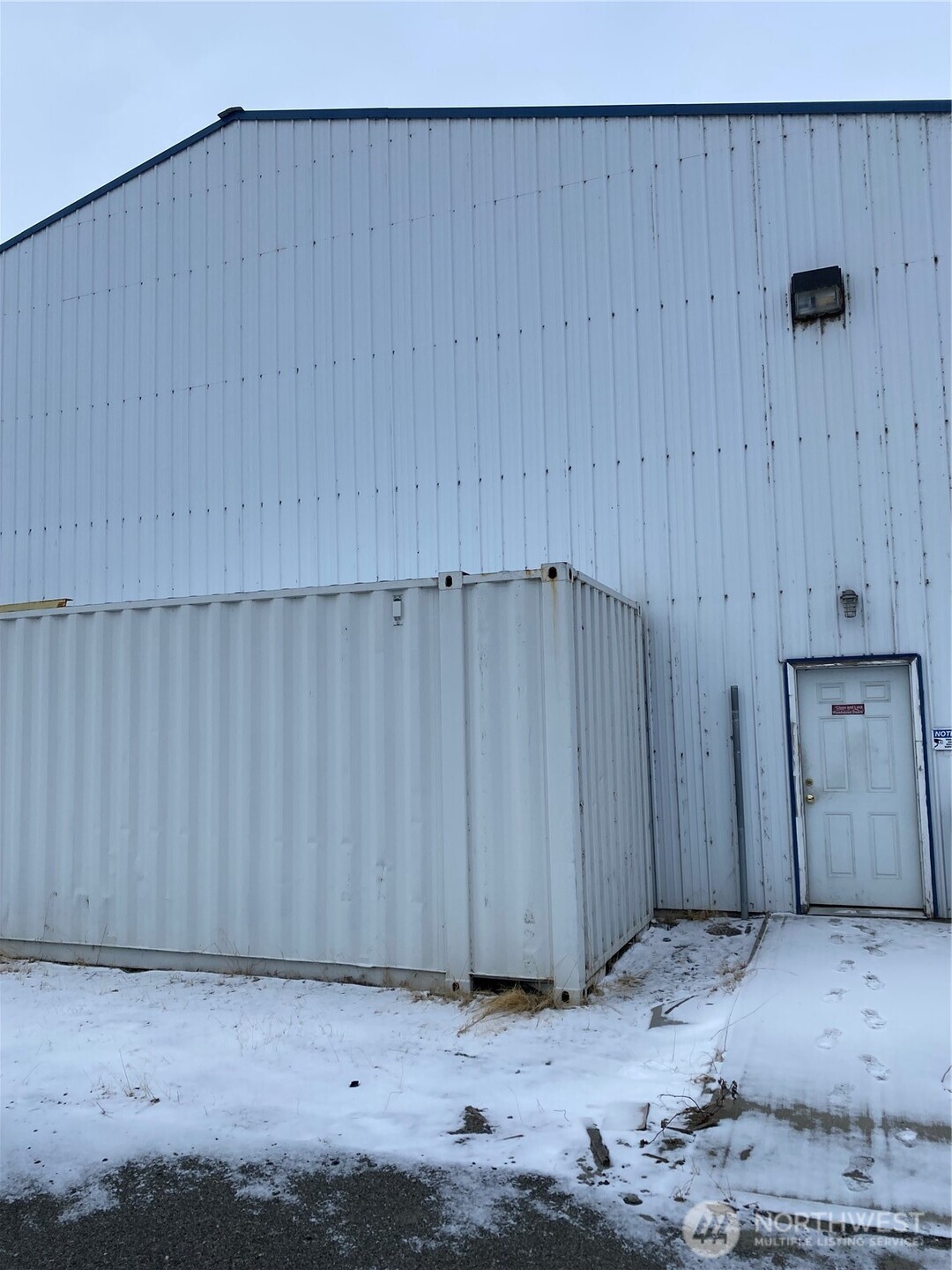 14277 Us Highway Entiat, WA 98822 - Photo 17 of 18 an empty room with a wooden wall