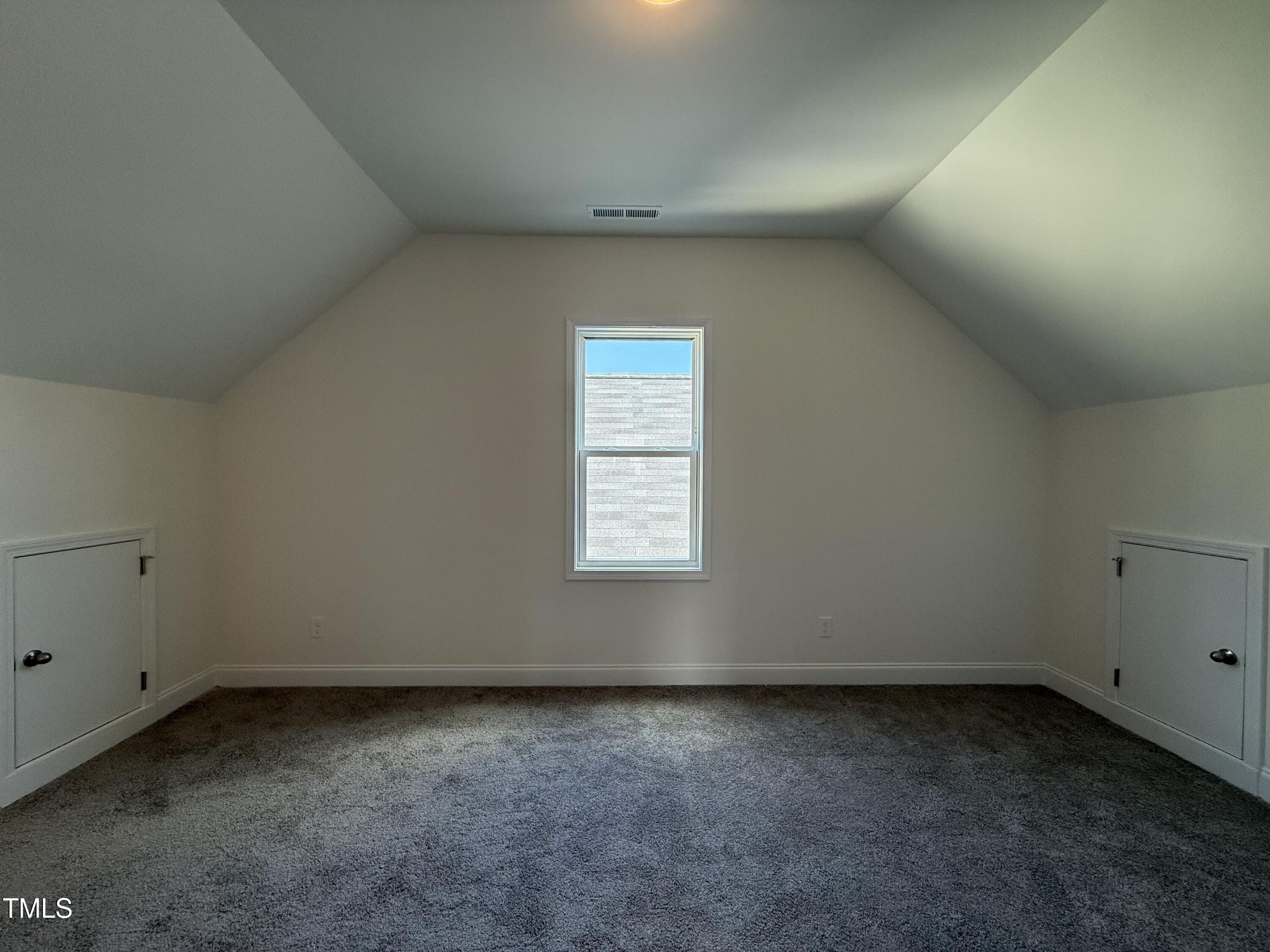 432 Springtooth Drive Zebulon, NC 27597 - Photo 11 of 15 an empty room with a window