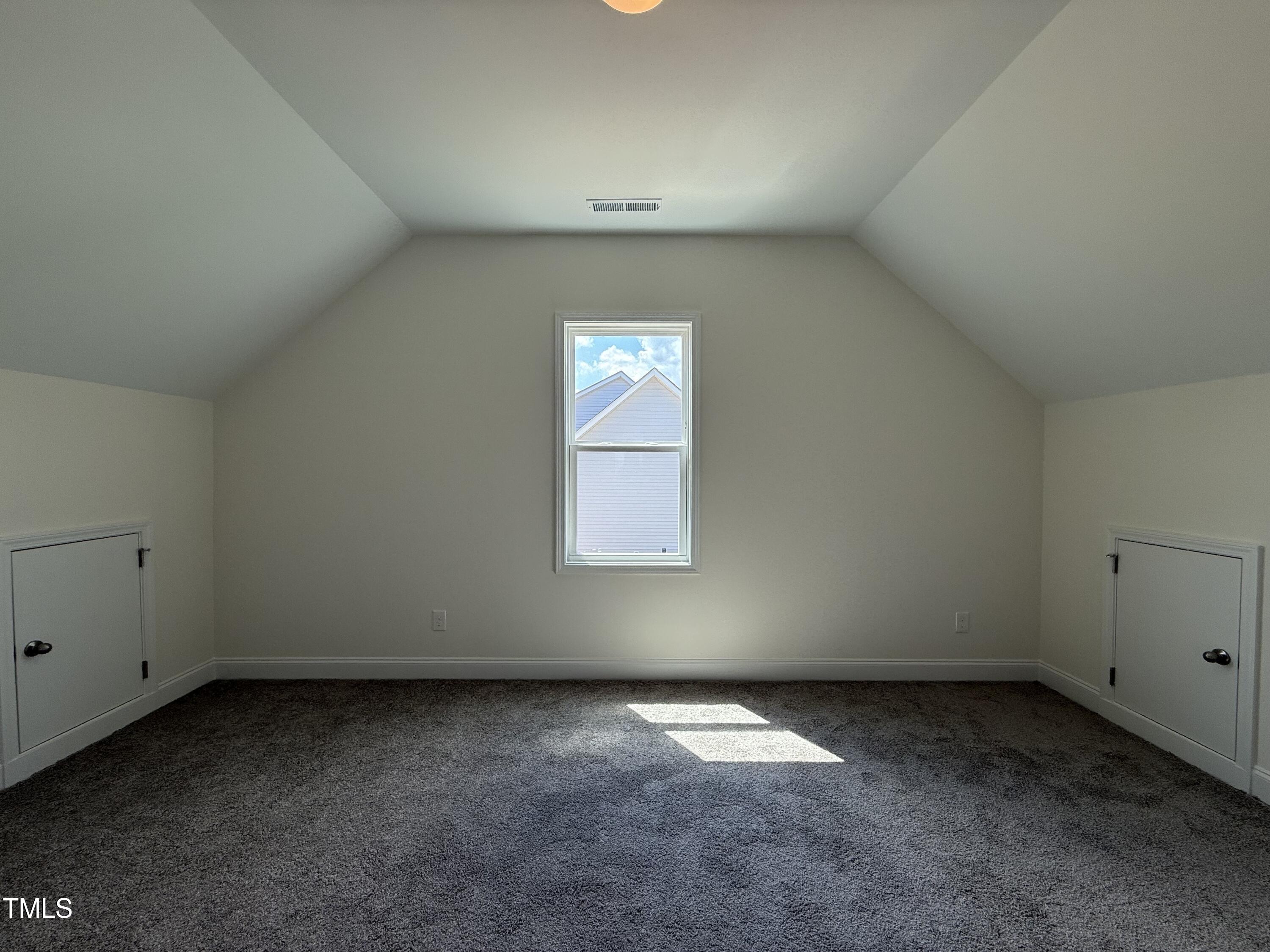 432 Springtooth Drive Zebulon, NC 27597 - Photo 10 of 15 an empty room with a window