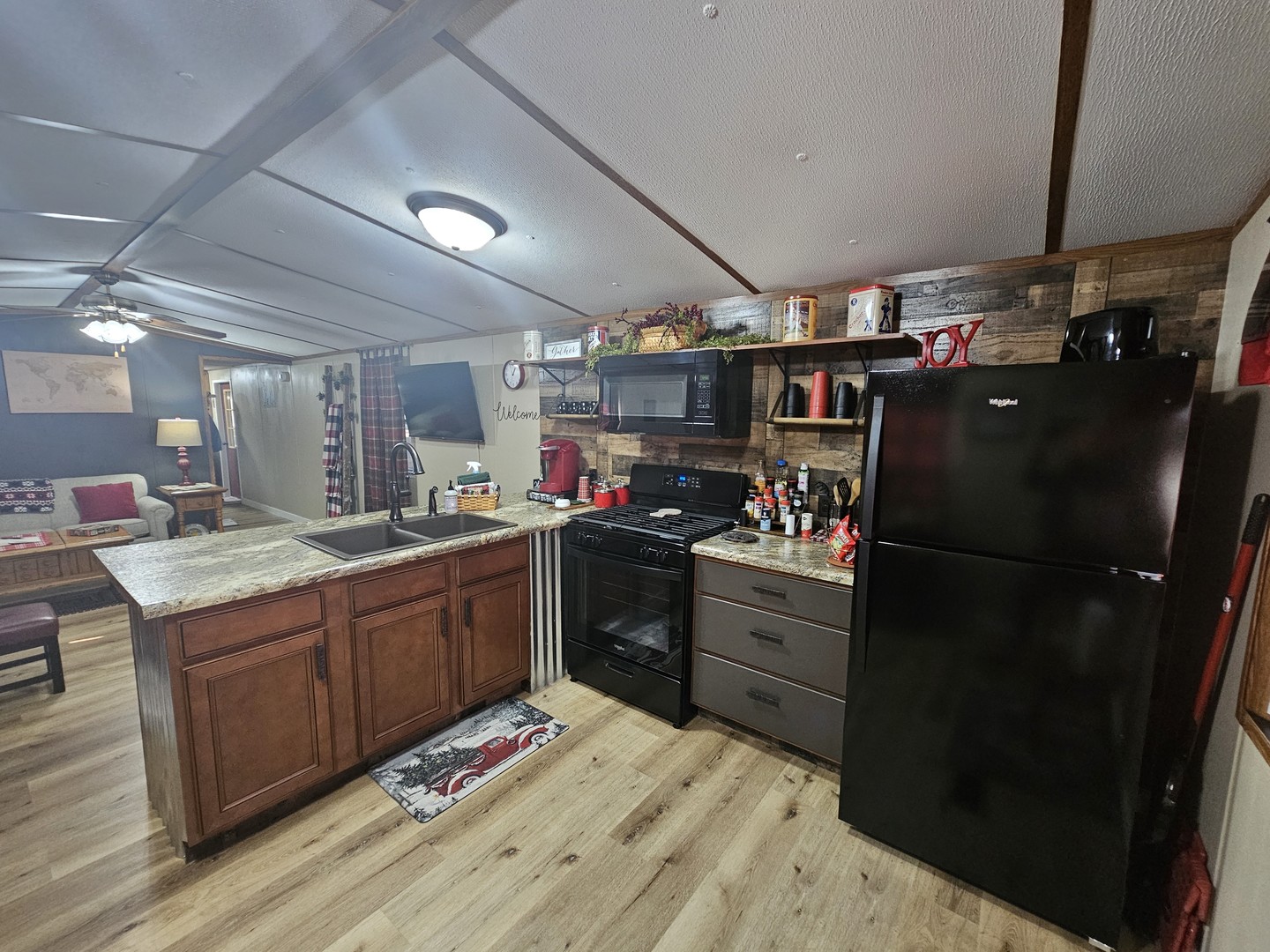 190 West 5th Street Bonnie, IL 62816 - Photo 18 of 25 a kitchen with a refrigerator and a sink