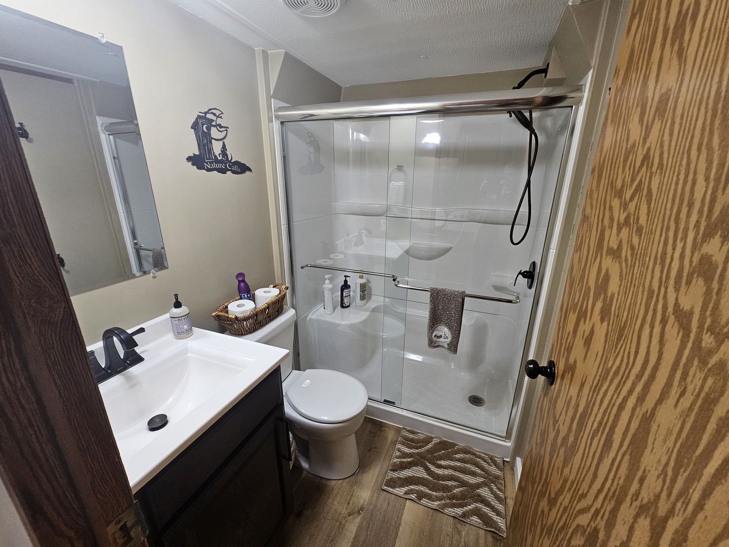 190 West 5th Street Bonnie, IL 62816 - Photo 23 of 25 a bathroom with a sink toilet and shower