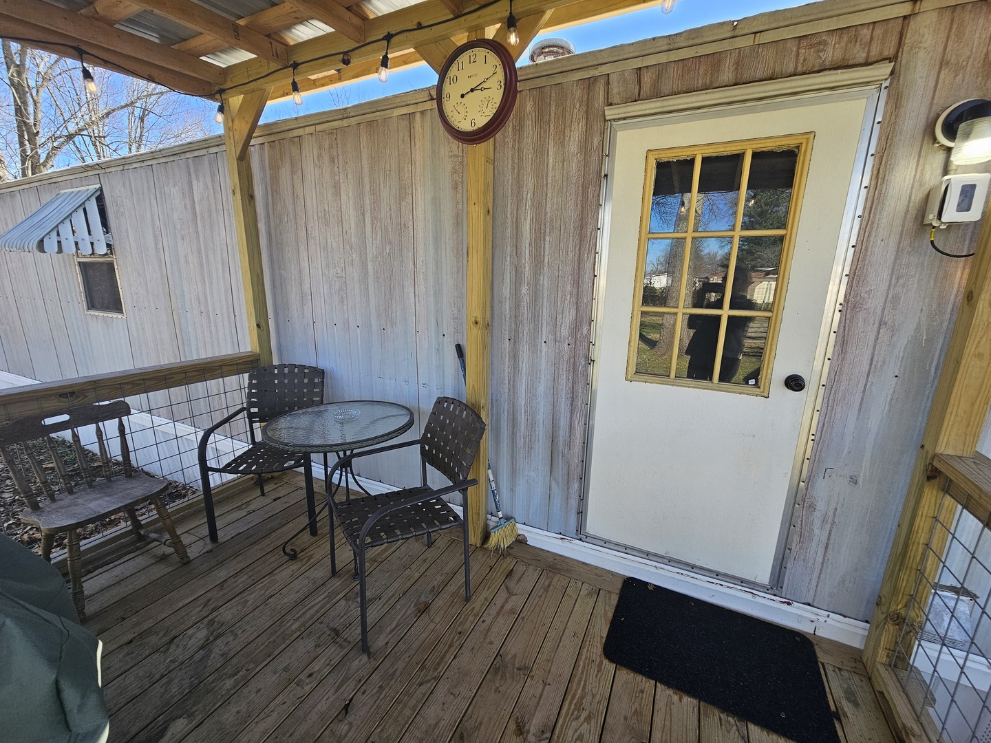 190 West 5th Street Bonnie, IL 62816 - Photo 6 of 25 a view of a porch with furniture and wooden floor
