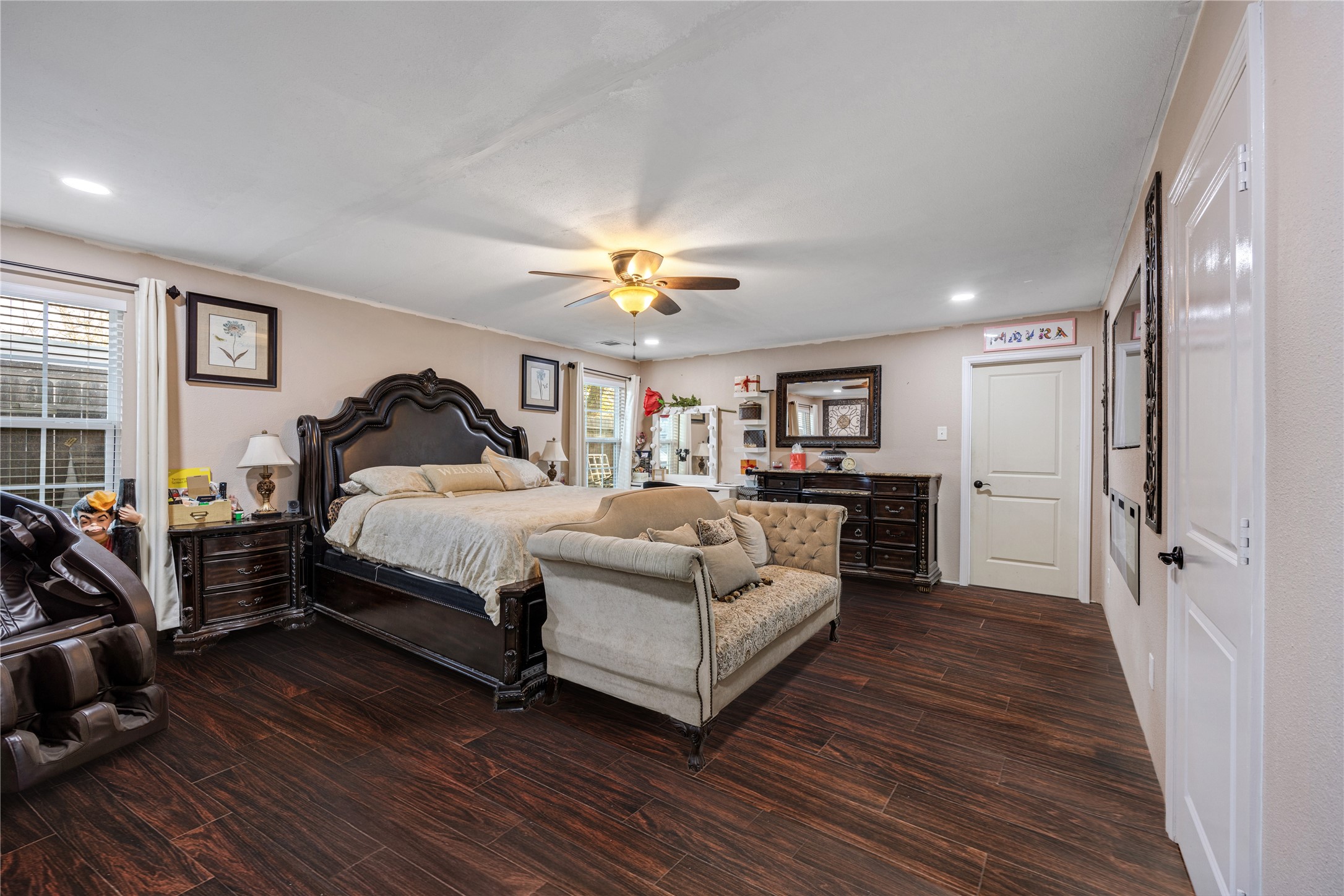 922 Gilpin Street Houston, TX 77034 - Photo 17 of 26 a bedroom with a bed and wooden floor