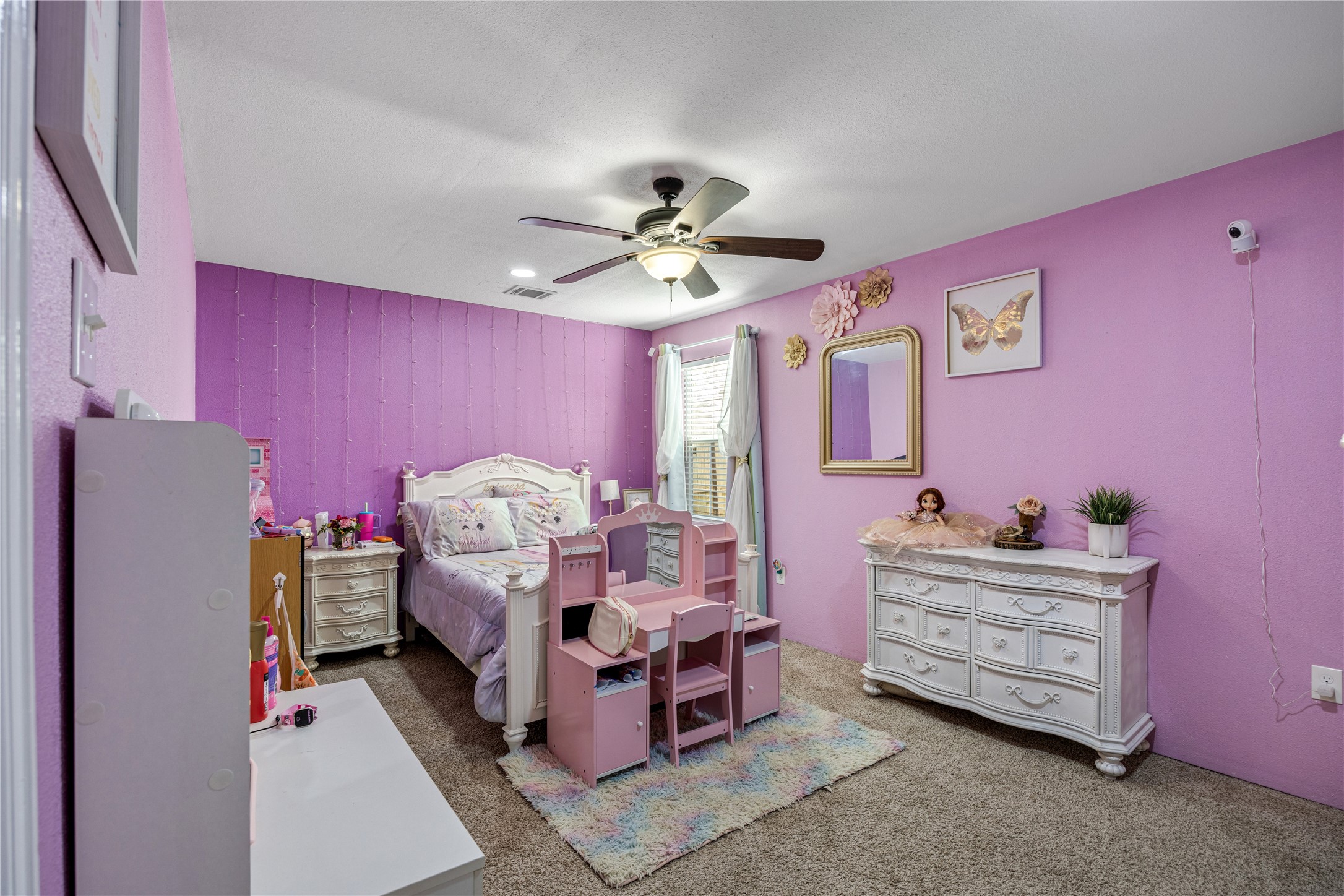 922 Gilpin Street Houston, TX 77034 - Photo 20 of 26 a living room with furniture and a chandelier