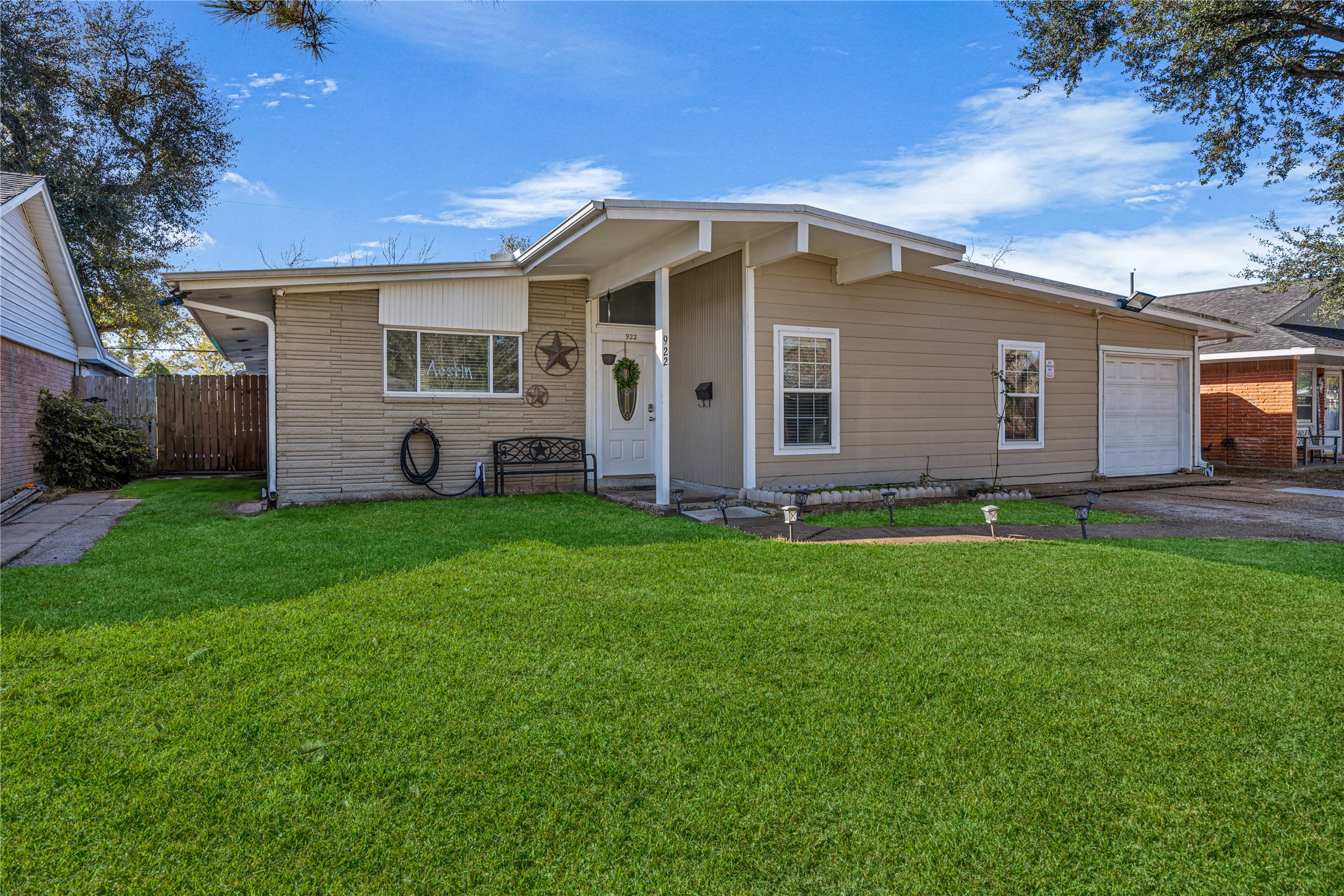 922 Gilpin Street Houston, TX 77034 - Photo 2 of 26 a front view of house with yard