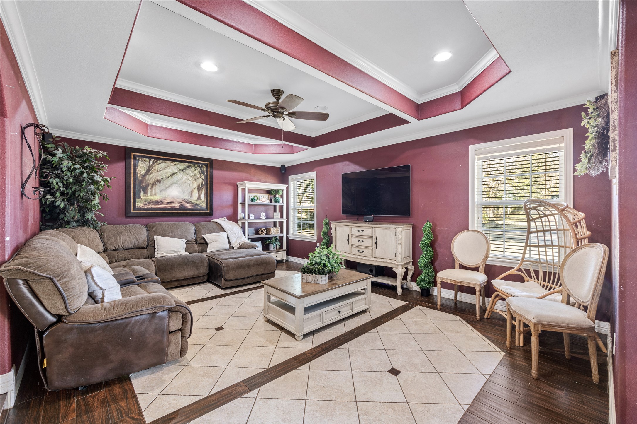 922 Gilpin Street Houston, TX 77034 - Photo 5 of 26 a living room with furniture a flat screen tv and a large window