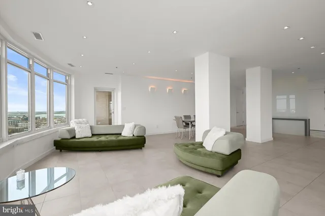 a bedroom with a bed and a table