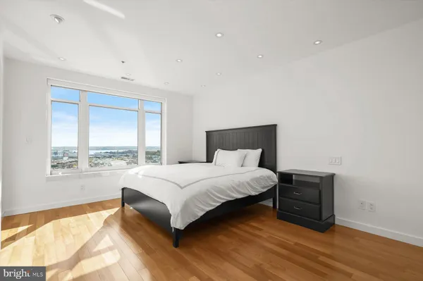 a view of a livingroom with furniture and a window