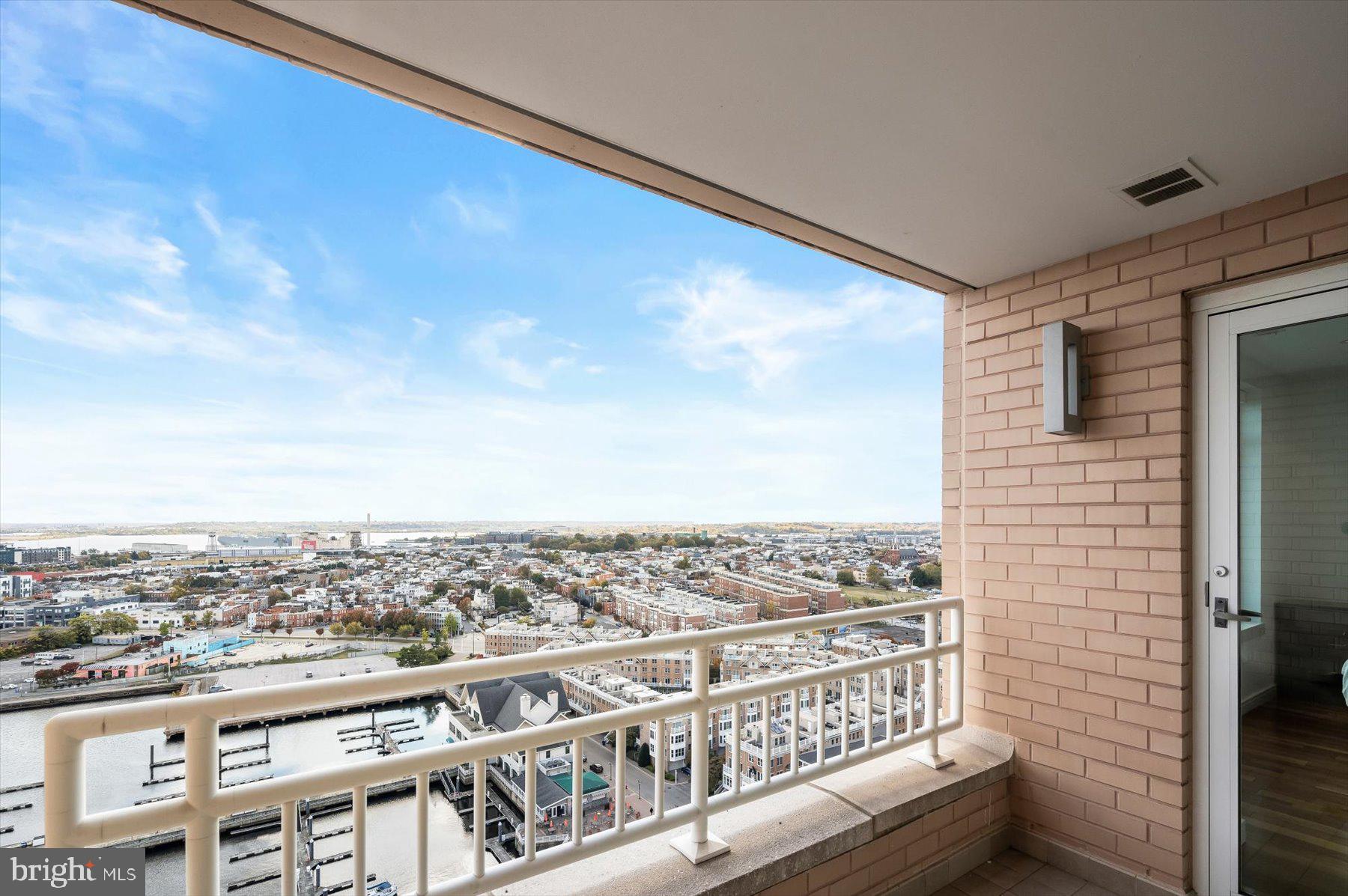 100 Harborview Drive, Unit 1901 Baltimore, MD 21230 - Photo 46 of 107 a view of a city from a balcony