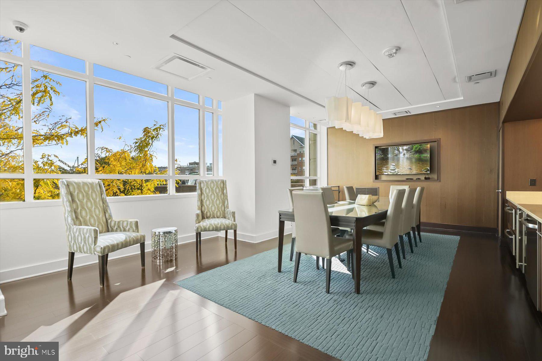 100 Harborview Drive, Unit 1901 Baltimore, MD 21230 - Photo 86 of 107 a view of a dining room with furniture and wooden floor