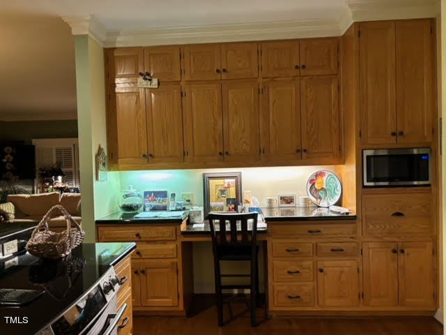 7 Hastings Square Durham, NC 27707 - Photo 13 of 28 a kitchen with granite countertop a cabinets and outdoor view of living room