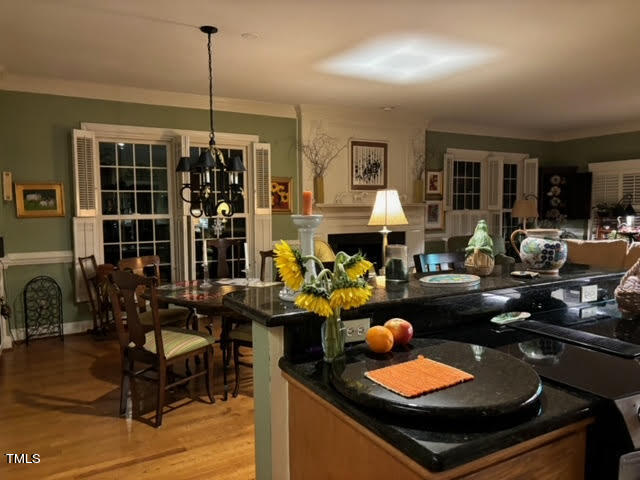 7 Hastings Square Durham, NC 27707 - Photo 14 of 28 a living room with furniture and chandelier
