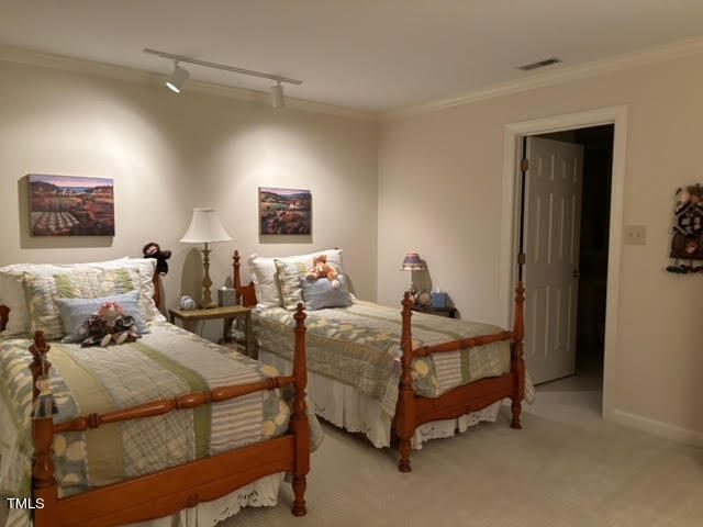 7 Hastings Square Durham, NC 27707 - Photo 24 of 28 a bedroom with two beds and a night stand