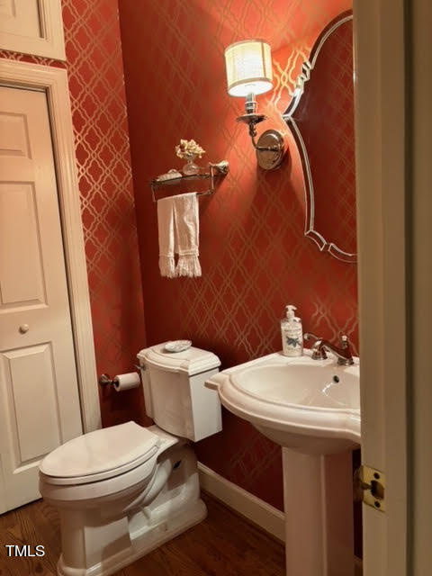 7 Hastings Square Durham, NC 27707 - Photo 28 of 28 a bathroom with a sink and mirror with toilet