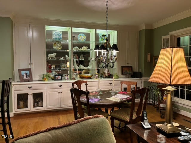 7 Hastings Square Durham, NC 27707 - Photo 10 of 28 a view of a dining room with furniture and chandelier