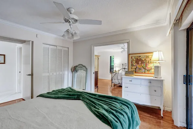 a bed room with a bed and a television