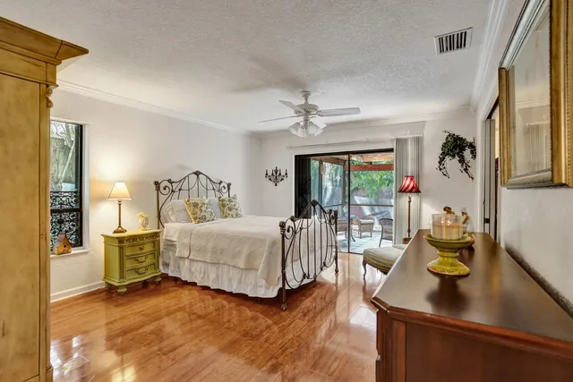 a bathroom with a toilet sink and shower