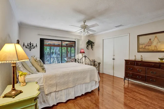 a bathroom with a tub a double vanity sink and a mirror