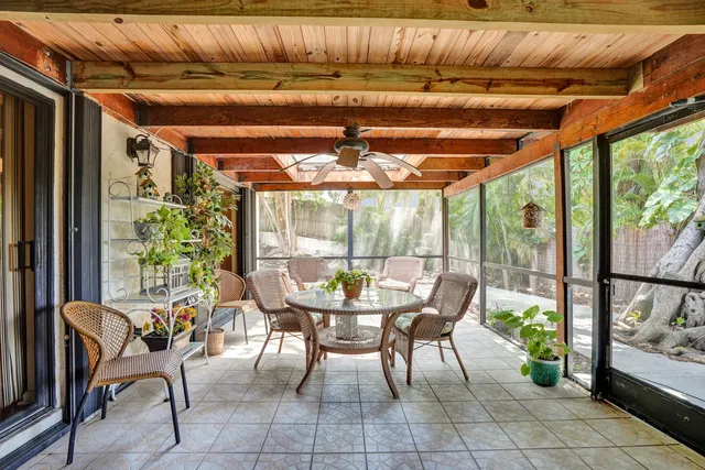 a view of an outdoor sitting area with furniture
