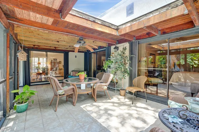 a view of a bench in a backyard