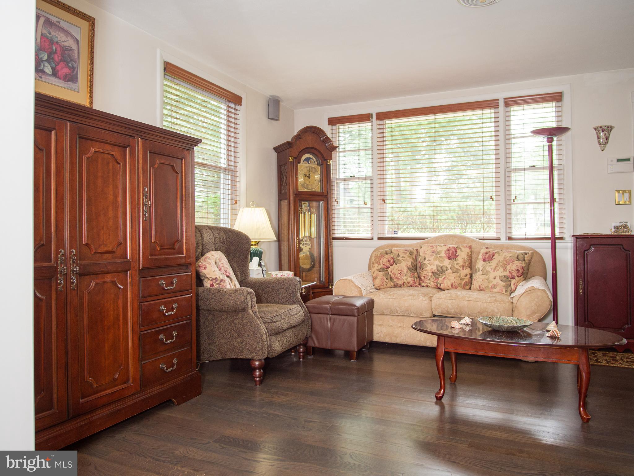 7734 Carter Road Sykesville, MD 21784 - Photo 8 of 31 Living Room with New Hardwood Flooring