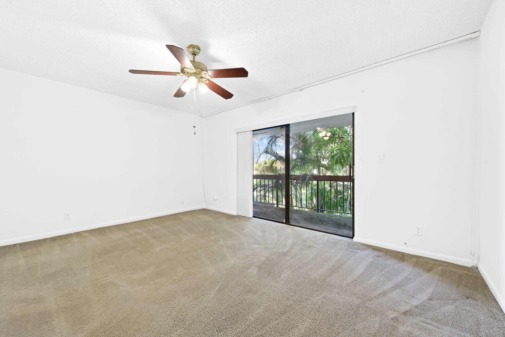 6491 Racquet Club Drive, Unit 36 Lauderhill, FL 33319 - Photo 18 of 24 a view of an empty room with a window