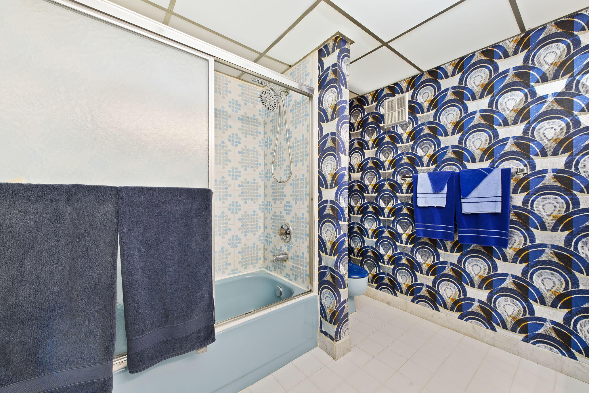 6491 Racquet Club Drive, Unit 36 Lauderhill, FL 33319 - Photo 20 of 24 a bathroom with a bathtub and shower