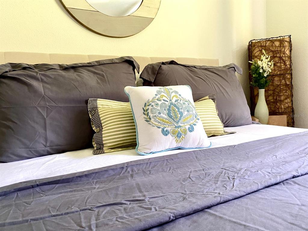 415 Mapleway, Unit A & B Safety Harbor, FL 34695 - Photo 38 of 56 a view of a couch in a balcony