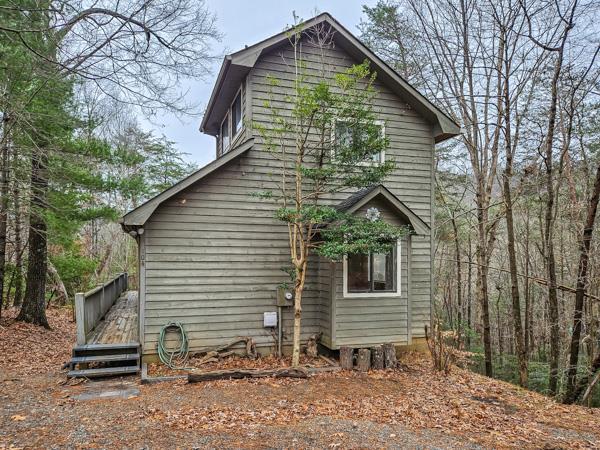 104 Pine Ridge Road Ellijay, GA 30536 - Photo 1 of 49 a view of a house with a yard
