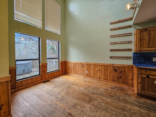 104 Pine Ridge Road Ellijay, GA 30536 - Photo 17 of 49 a view of an empty room with a fireplace and a window
