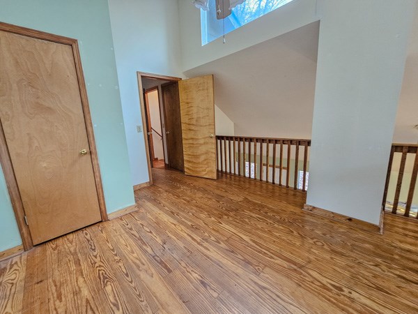 104 Pine Ridge Road Ellijay, GA 30536 - Photo 35 of 49 a view of a hallway with wooden floor and stairs