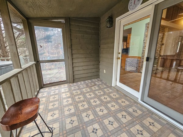 104 Pine Ridge Road Ellijay, GA 30536 - Photo 37 of 49 a bedroom with a bed and a mirror