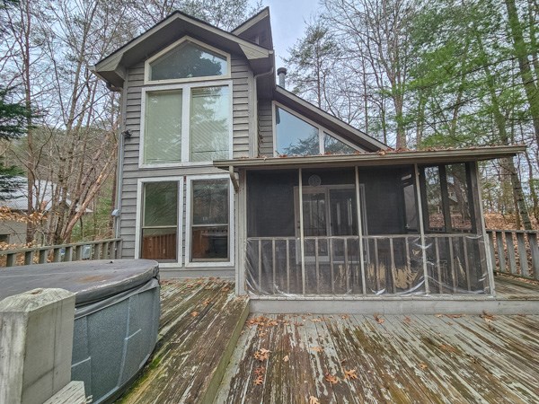 104 Pine Ridge Road Ellijay, GA 30536 - Photo 45 of 49 a front view of a house with a yard