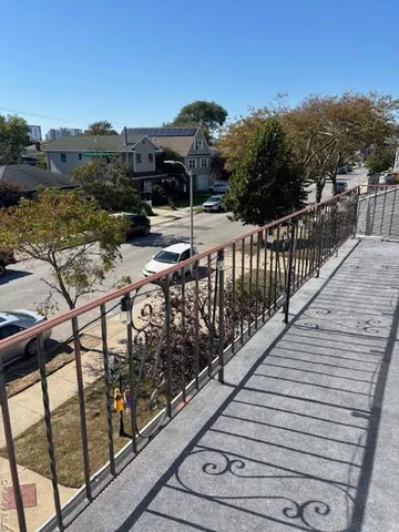a view of balcony with furniture