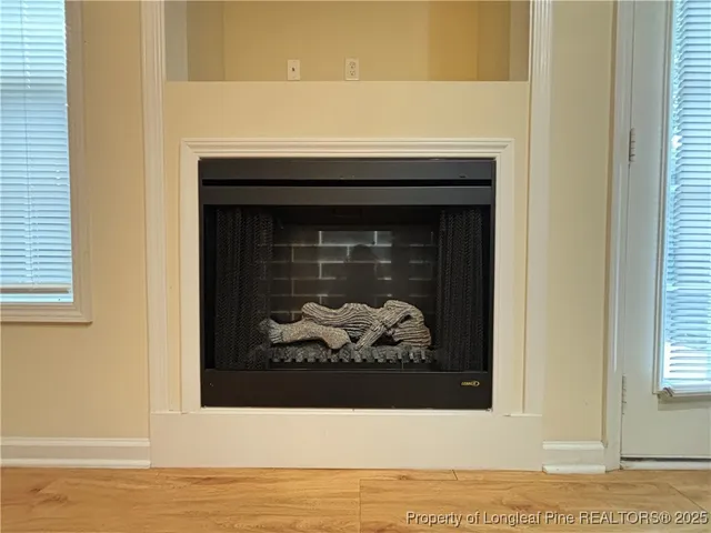 a white building with a fireplace