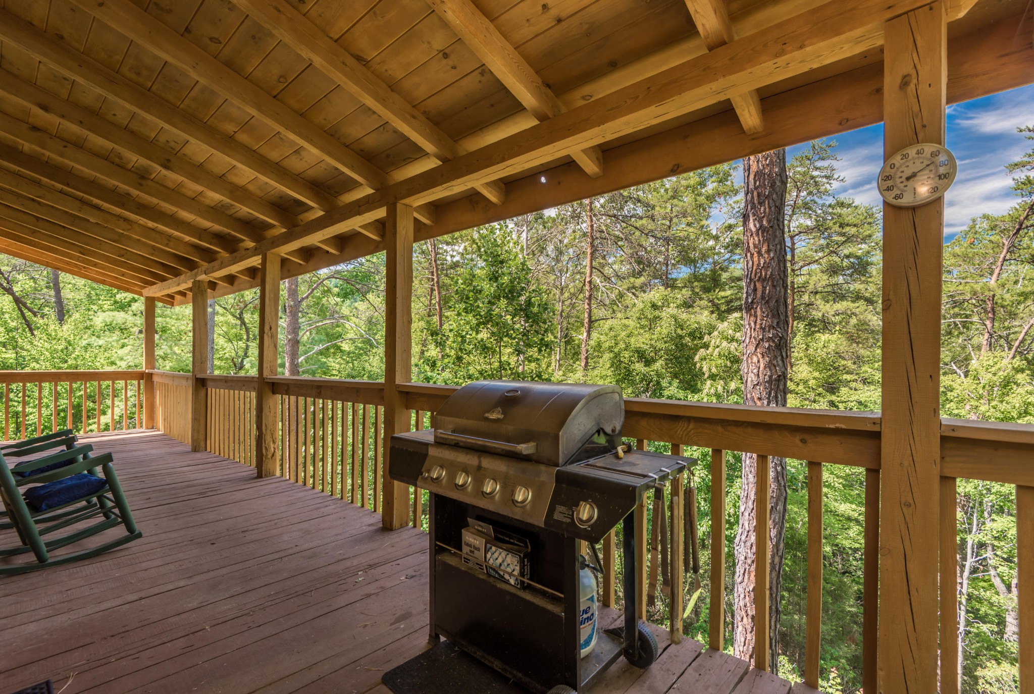 3104 Clearview Road Sevierville, TN 37862 - Photo 11 of 36 a view of a balcony with chairs and wooden floor