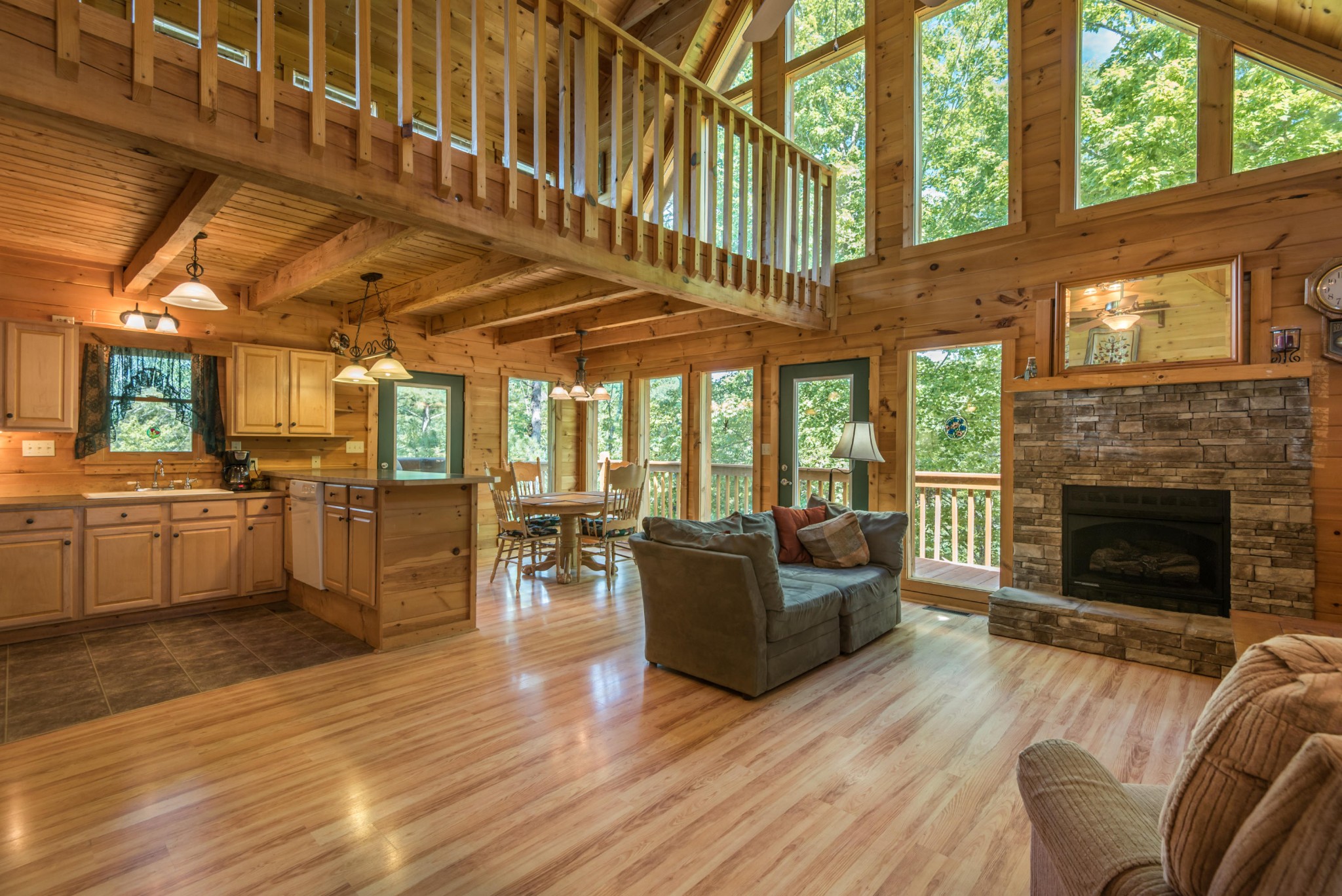 3104 Clearview Road Sevierville, TN 37862 - Photo 15 of 36 a living room with furniture and a fireplace