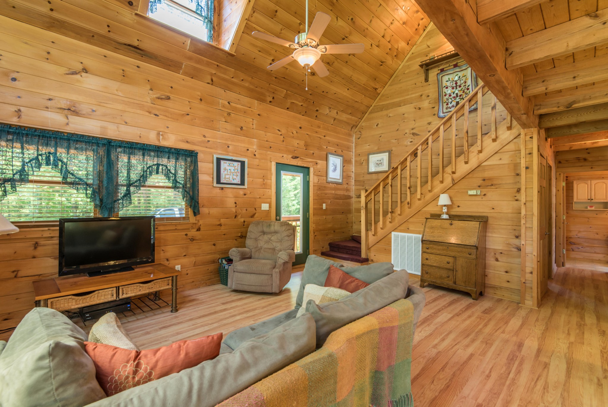 3104 Clearview Road Sevierville, TN 37862 - Photo 17 of 36 a bedroom with furniture and a flat screen tv