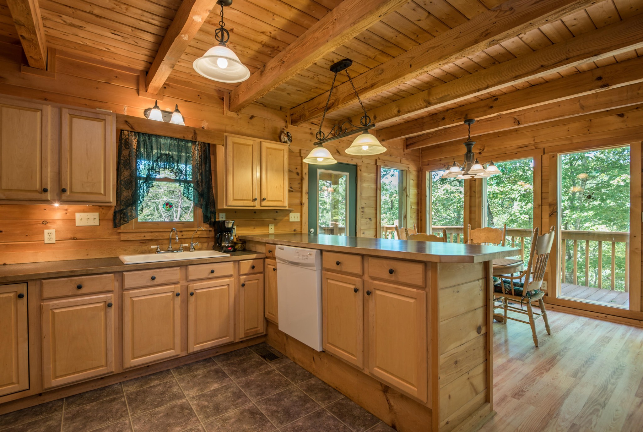 3104 Clearview Road Sevierville, TN 37862 - Photo 19 of 36 a kitchen with sink cabinets and wooden floor