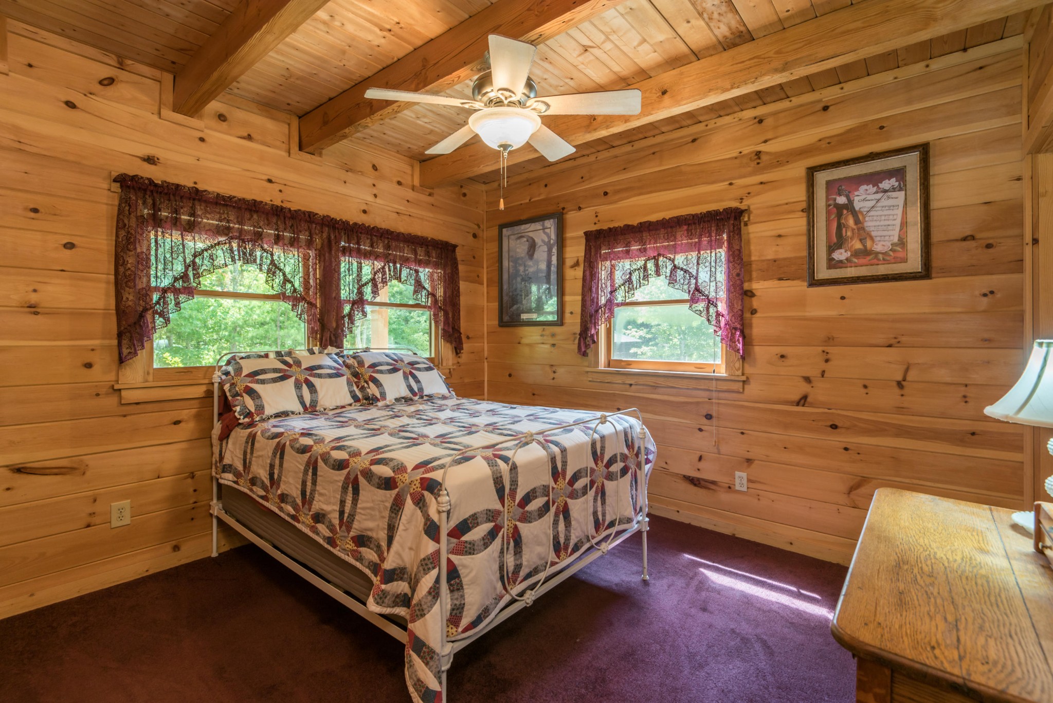 3104 Clearview Road Sevierville, TN 37862 - Photo 23 of 36 a bed sitting in a spacious bedroom next to a window