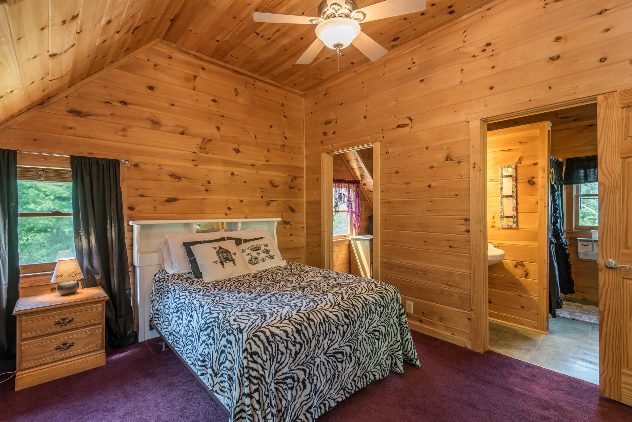 3104 Clearview Road Sevierville, TN 37862 - Photo 27 of 36 a bedroom with a bed and a dresser