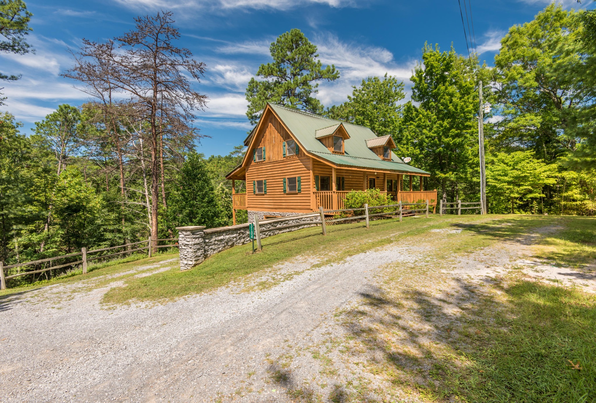 3104 Clearview Road Sevierville, TN 37862 - Photo 5 of 36 a view of a house with a yard patio and deck