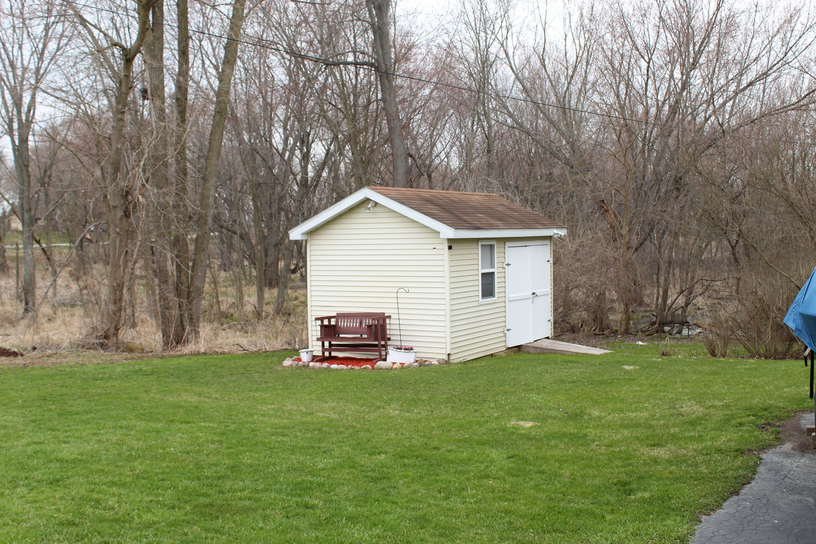 28451 Valley Road Ingleside, IL 60041 - Photo 17 of 21 a front view of house with yard and green space