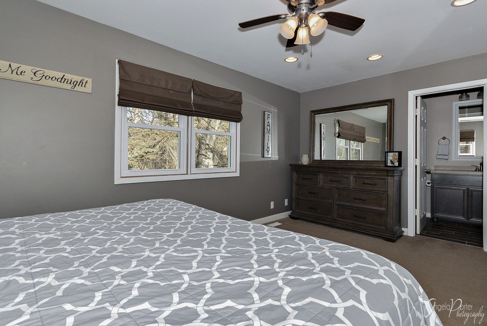 28451 Valley Road Ingleside, IL 60041 - Photo 7 of 21 a bedroom with a bed and a dresser