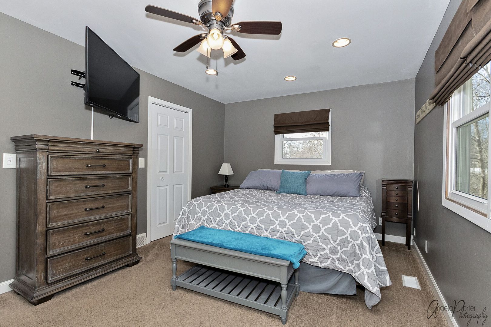 28451 Valley Road Ingleside, IL 60041 - Photo 9 of 21 a bedroom with a bed chandelier and a window
