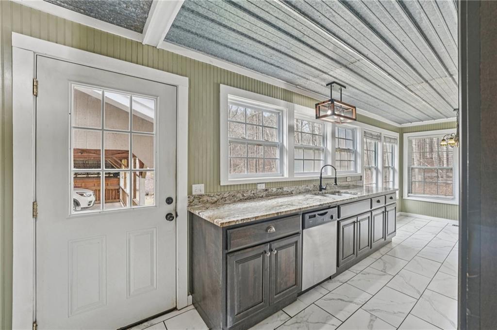 257 Shellhorse Road Southeast Ranger, GA 30734 - Photo 13 of 44 a kitchen with a sink and cabinets
